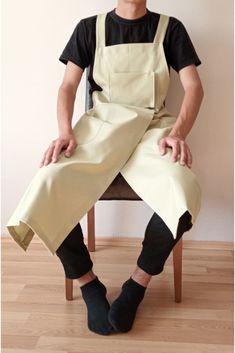 The Slipster Pottery apron features a split foot design to accommodate working on the potter's wheel. Convenient pockets on chest and on each leg for easy access to your clay tools. Canvas material is durable for working with clay.Linen aprons with pockets, washed diagonally on the back. The light and soft apron will give you a stylish and mess-free cooking experience. Aprons come in sizes S-M and L-XL for the best fit. The apron set is a great gift idea for anyone who loves to cook, do crafts o Creative Apron Design, Barista Uniform, Pottery Apron, Split Leg Apron, Linen Aprons, Aprons With Pockets, Japanese Style Apron, Do Crafts, Apron Design