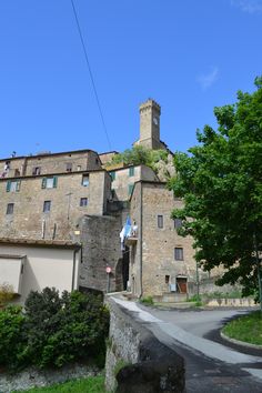 an old stone building with a clock tower