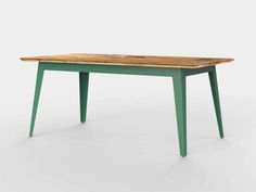 a wooden table with green legs and a wood top on an isolated white background,