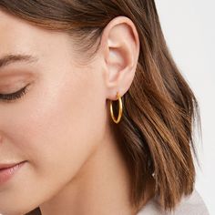 Lightly hammered shimmering 2-in-1 earring that can be worn as a single or double hoop. 2 inch length 24K gold plate Julie Vos hallmark Julie Vos, Gold Dangle Earrings, Custom Stationery, Dramatic Look, Fine Linens, Gold Earrings Dangle, Elegant Gift, Jewelry Care, Hallmark