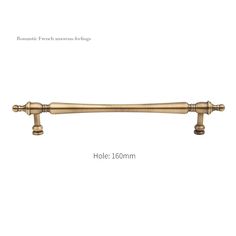 an image of a brass handle on a white background, with measurements for the handles