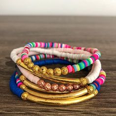 Live life colorfully with our Skinny Mini Hailey bracelet! Whether you're adding to your arm party with one of our colorful handmade bracelets or rocking the rainbow with a pair of earrings, you're sure to be the best accessorized. Made from colorful disc beads with pops of gold or rose gold, each piece is guaranteed to make you happy just by wearing it! When placing an order for the Hailey bracelets, please leave the following information in the Special Instructions Box: Choose a color and styl Mini Bracelet, Wear Pearls, Clay Bracelet, Arm Party, Be The Best, Bracelet Stack, The Rainbow, Handmade Bracelets, Live Life