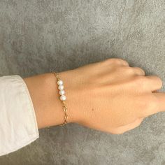 A real pearl bracelet with genuine pearls and 925 sterling silver. If you are looking for Christmas Gifts or bridesmaid gifts this pearl boho bracelet is a great idea. You will love to wear it every day! This dainty boho bracelet adds a sparkling shine to your look!  Ideal for a wedding day as wedding jewelry!❤️️❤️️ 👉Handmade with love in Greece! Material  ✔️Pearl original gemstone ✔️Gold-filled  925 sterling silver      >>IS IT A GIFT?❤️️ This dainty bracelet comes in a beautiful gift box. If Adjustable Pearl Drop Bracelet As Gift, Pearl Drop Bracelet As Gift, Adjustable Pearl Drop Bracelet For Gift, Pearl Chain Beaded Bracelets As Gift, Pearl White Oyster Bracelet As A Gift, Pearl Chain Beaded Bracelet As A Gift, Pearl White Beaded Bracelets With Pearl Chain As Gift, Pearl White Bracelet With Round Beads For Gifts, Elegant Pearl Bracelet With Extender As Gift