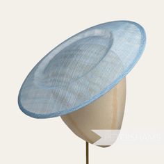 This extra large light blue saucer/plate style sinamay fascinator base is made from a triple layer of stiffened sinamay millinery fabric and is ideal for making an instant hat! Get creative by positioning it at different angles on the head. Just add elastic or headband for securing to the head (not included but available in my shop!) Measurements: Width: 29cm (11.4 inches) Depth at center crown: 4cm (1.5 inches) Has a shallow curvature at crown for resting on the head. For my full range of milli Blue Sinamay Fascinator For Kentucky Derby, Blue Sinamay Fascinator For Wedding, Blue Sinamay Hat For Summer, Blue Sinamay Hat For Party, Adjustable Blue Sinamay Fascinator, Blue Fitted Fascinator With Curved Brim, Blue Fitted Sinamay Fascinator, Blue Adjustable Sinamay Fascinator, Elegant Blue Sinamay Fascinator