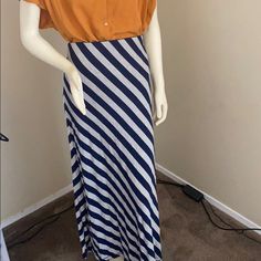 Navy Blue & Gray Stripped Maxi Skirt. Brand New With Tags. 95% Rayon 5% Spandex. Casual Blue Stretch Maxi Skirt, Fitted Striped Maxi Skirt For Spring, Casual Striped Mini Skirt, Casual Striped Lined Skirt, Casual Striped Skirt For Day Out, Casual Striped Flowy Skirt, Casual Striped Flowy Bottoms, Casual Striped Long Skirt, Casual Striped Skirt