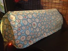 a blue and white table cloth with circles on it