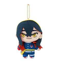 an anime character keychain hanging on a white background with a chain attached to it