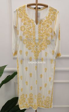 DESCRIPTION ▪ Fabric: Modal ▪ Sleeves: 3/4 Sleeves ▪ Style: Straight Kurti ▪ Length: 44-46 Inches ▪ Occasions: Casual Wear, Office Wear, Festive Wear ▪ Garment Care: Hand Wash Only ▪ Net Content: Only Kurti Festive Embroidered Kurta With 3/4 Sleeves, Festive 3/4 Sleeve Embroidered Kurta, White Long Sleeve Dresses For Diwali, Semi-stitched Long Sleeve Kaftan For Festivals, Festival Semi-stitched Long Sleeve Kaftan, Summer Festive Kurta With 3/4 Sleeves, Fitted Kaftan With Resham Embroidery For Eid, Traditional Off White Dress For Festivals, Traditional Off-white Dress For Festivals