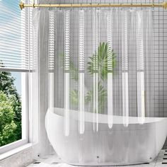 a white bath tub sitting next to a window