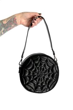 Matte black crossbody bag with black spiderweb design all over. Main zipper pocket with small zipper pocket on inside. Bag dimensions: 8.5 inches long 3.5 inches wide Short strap end to end: 23inches Adjustable cross body strap full length: 50 inches. 100% PU Leather. Imported. An original design by your favorite Hollywood Ghoulfriends, Goblin Co. Spiderweb Design, Black Crossbody Bag, Belt Jewelry, Inside Bag, Beauty Sale, Black Crossbody, Black Cross Body Bag, Spider Web, Sock Shoes