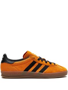 pumpkin orange/black cotton mesh design front lace-up fastening contrasting branded heel counter signature trefoil logo detail signature 3-Stripes logo suede trim round toe leather lining branded insole logo at the sole rubber outsole These styles are supplied by a premium and authenticated sneaker marketplace. Stocking only the most sought-after footwear, they source and curate some of the most hard to find sneakers from around the world. Adidas Orange Lace-up Custom Sneakers, Orange Adidas Logo Sneakers For Streetwear, Adidas Orange Sneakers With Branded Insole, Adidas Orange Leather Sneakers, Orange Fade-resistant Sneakers For Streetwear, Balenciaga Track, Adidas Gazelle, Black Sneakers, Athletic Sneakers