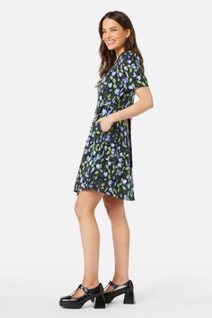 Floral printed mini dress, a gorgeous vine of fragrant flowers, fresh peas & cute bees. This sweet dress has short sleeve, sweet flare and side ties- Fitted bodice with flared skirt - length ends above knee- rounded neckline - short sleeve with slight puff - wide side ties - invisible back zipper - made of a linen viscose blend - available in navy & cream Product Code: PGFY059 Cute Bees, Fresh Peas, Fragrant Flowers, Rounded Neckline, Colorblock Dress, Knitwear Tops, Sweet Dress, Flared Skirt, Smock Dress