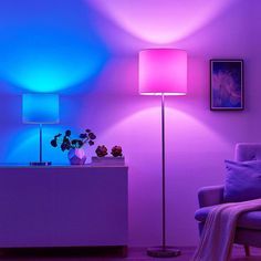 a living room with purple and blue lighting