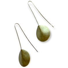 Drop earrings with matted finish for a modern sensibility. The bottom is either a disk, or a cone shaped tinged with tiny crystals. A quick way to add a shimmer to complete any outfit. Details: Hook fastenings for pierced ears. Size: Length of drop: ~ 3" (7 cm), widest portion: ~ 1" (2.5 cm) Material: Brass, silver-plated brass Modern Silver Round Disc Earrings, Minimalist Metal Teardrop Earrings, Minimalist Hammered Drop Earrings, Modern Sterling Silver Round Disc Earrings, Modern Nickel-free Round Disc Earrings, Minimalist Metal Long Drop Threader Earrings, Silver Teardrop Brass Earrings, Minimalist Teardrop Metal Earrings, Modern Nickel-free Threader Earrings