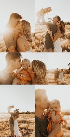 a man and woman kissing while holding a baby in the middle of an open field