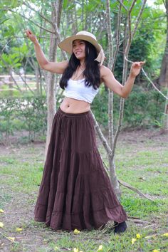 From Twist and Crinkle Collection Colour light brown with a tinge of green  It's a similar skirt to my smock elastic waist skirts. For those people who prefer the smaller waistband. This lovely Boho piece is made from 100% cotton. It's half-lined with an elastic waistband. and ties The skirt is in 5 tiers. It is a great piece to wear with a tight or cropped top. It is very comfortable to wear and easy to care for, no need to iron just twist and crinkle and tie it with an elastic to keep it together Please note this is not a bleached white coloured skirt. Wash on a cold cycle, hang to dry, or tumble dry low Waist 22'' inches - 42'' inches Hips 56'' inches free size Length 39'' inches For your reference, the model is ( 5'1 tall , 32'' bust , 27'' waist and 35 '' hips ) Non-stretch Long Brown Skirt, Non-stretch Brown Long Skirt, Bohemian Style Solid Color Lined Skirt Bottoms, Bohemian Solid Color Lined Skirt, Bohemian Solid Color Skirted Bottoms, Bohemian Style Skirted Bottoms, Bohemian Skirted Bottoms, Casual Full Length Brown Skirt, Full Length Brown Relaxed Fit Skirt