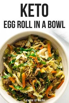 an egg roll in a bowl with carrots and lettuce