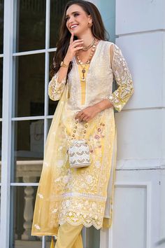 This exquisitely designed soft organza pant style suit Pakistani Suit is embellished with delicate resham thread work, beads, sequins, and lace work, making it a standout piece for any occasion. From festive celebrations to social gatherings and cultural events, this pant suit showcases the ultimate combination of style and grace. Fit: Slim Fit (more fitted and snug at bust area) Top: Soft Organza Silk Bottom: Blended Silk Dupatta: Embroidered Organza Silk Resham thread work, beads, sequins, and Sharara Suit Pakistani, Phulkari Pants, Area Top, Lucknowi Kurta, Gharara Suits, Patiala Salwar Suits, Suit Pakistani, Bridal Dupatta, Phulkari Dupatta