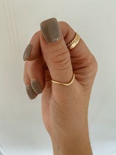 Our peak ring was made for stacking and is perfect if you’re looking for a simple band with an arch setting. Stack it with our evil eye ring or bold pearl ring. Minimalist Double Band Stackable Promise Rings, Stackable Double Band Promise Rings, Stackable Double Band Promise Jewelry, Minimalist Adjustable Round Band Rings, Adjustable Minimalist Round Band Rings, Adjustable Toe Ring For Everyday Wear, Dainty Stackable Open Band Rings, Adjustable Everyday Rings With Round Band, Thick Stackable Bands For Promise Ring