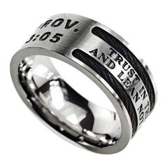 Ships in 1 to 2 business days This men's Christian ring with Scripture is unique and high quality. Makes a great gift for a special man in your life. Brushed stainless steel with encased black cables. Engraved and black enamel filled Scripture reads: "Prov. 3:5 - Trust In The Lord With All Your Heart And Lean Not On Your Own Understanding" Dome shaped comfort fit band Available in sizes 8 through 14 Black Stainless Steel Promise Jewelry, Black Stainless Steel Promise Ring, Silver Stainless Steel Jewelry With Black Band, Purity Rings, Cable Ring, Man Of God, Micro Pave Ring, Purity Ring, Leaf Engagement Ring