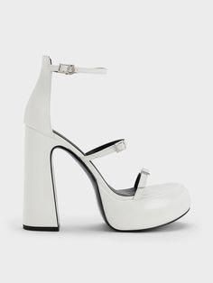 Take your outfits to the next level when you complete your look with the Elvina platform sandals in lustrous white. Set on formidable 13cm tall block heels, these heels will instantly elevate your style and stature. Featuring chunky platform soles and a trio of skinny adjustable straps that are as functional as they are stylish, these sandals will stay stable and secure on your feet all day long. White Platform Sandals, Size Chart For Kids, Faux Leather Heels, White Set, Chunky Block Heels, Charles Keith, Chunky Platform, Belt Size, Platform Heels