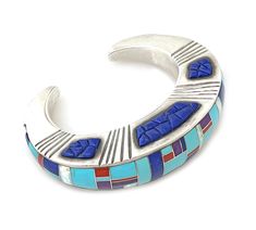 New, one of a kind Ben Nighthorse bracelet! Sterling silver inlaid with turquoise, coral lapis, sugilite and white opal. 7/8” wide, sits 3/4” high and is a size 6 1/2. Blue Inlay Bracelet Jewelry, Southwestern Style Blue Inlay Bracelets, Blue Inlay Bracelet, Multicolor Inlay Sterling Silver Bracelets, Multicolor Sterling Silver Bracelet With Inlay, Multicolor Sterling Silver Bracelets With Inlay, Award Winning Jewelry, Bolo Ties, Bracelet Sterling Silver