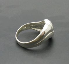 Stylish sterling silver ring 925/1000. Stamped 925.Approximate weight 4.2 grams. Top width 1.2cm. All our jewels are made from solid sterling silver 925/1000 and are carefully crafted by hand in our family workshop. We dispatch your orders in 5 working days, worldwide and the postage is $5. We ship registered priority mail. Please allow 5-7 working days for delivery in Europe and 10-15 working days outside Europe. For any questions - please do not hesitate to contact me! Sterling Silver Hallmarked Dome Ring, Sterling Silver Concave Ring Stamped 925, Sterling Silver Concave Rings Hallmarked, Sterling Silver Concave Hallmarked Rings, Classic Silver Heart Ring With Polished Finish, Sterling Silver Rings With Shiny Finish, Sterling Silver Signet Ring With 925 Stamp, Silver Concave Signet Ring With Polished Finish, Silver Open Signet Ring Hallmarked