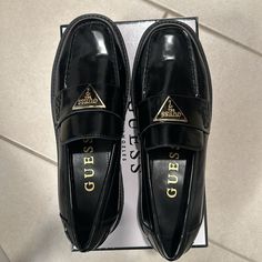 Black And Gold Guess Loafers Trendy Black Slip-ons For Formal Occasions, Black Low-top Loafers For Work, Guess Loafers, Guess Shoes, Black And Gold, Flat Shoes Women, Loafer Flats, New Color, Loafers