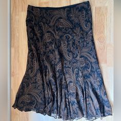 Nwt Ralph Lauren Silk Skirt Bobo Brown Paisley Midi Skirt Size Medium In Excellent Condition Nwt, Elastic Waist Band, Skirt Has Some Stretch To It, Very Flowy And Light Weight, Double Lined! Paisley Midi Skirt, Elegant Brown Tiered Skirt Bottoms, Ralph Lauren Fitted Skirt, Ralph Lauren Fitted Skirt With Lining, Fitted Ralph Lauren Lined Skirt, Ralph Lauren Fitted Lined Skirt, Elegant Brown Tiered Skirt, Casual Lined Skirt By Ralph Lauren, Elegant Fitted Paisley Print Skirt