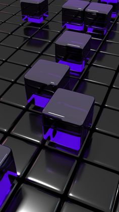 an array of black and purple objects on top of each other in the same pattern