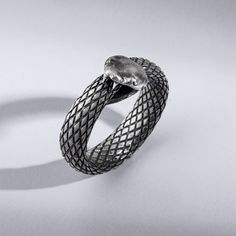 A unique and elegant ouroboros snake  ring with a the snake's body, cool style. This ring is made from sterling silver and will become one of your favorite rings in no time! It's also ideal for people who love to draw attention to themselves everywhere they go. Are you looking for an eye-catching ring? If yes, then this is the perfect ring for you. So if you like to make a statement, this is the ring for you. It's made with high-quality Sterling Silver. This silver ring is also known as a band r Adjustable Engraved Snake Ring, Unique Sterling Silver Snake Ring, Unique Engraved Snake Jewelry, Silver Snake-shaped Oxidized Jewelry, Silver Oxidized Snake-shaped Jewelry, Oxidized Silver Snake Jewelry, Elegant Sterling Silver Snake Ring, Elegant Silver Snake Ring, Snake-shaped Engraved Rings For Gifts