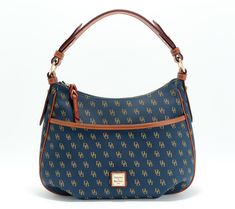 Let the logo show with this monogram bag. Crafted of coated cotton for a casual vibe, with interior zip and slip pockets, this carryall is a bag-lover's dream come true. From Dooney & Bourke. Monogram Canvas Bags With Zipper Closure For Everyday Use, Everyday Bags With Zipper Closure In Monogram Canvas, Everyday Monogram Canvas Bags With Zipper Closure, Brown Monogram Canvas Bag With Zipper Pocket, Casual Monogram Canvas Shoulder Bag For Everyday, Casual Monogram Canvas Bags For Everyday Use, Travel Tote Bag With Monogram Print, Classic Monogram Print Shopping Bags, Monogram Print Coated Canvas Shoulder Bag For Travel