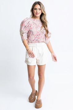 This Paris Floral Crochet Trim Top features a beautiful floral print. The delicate crochet detailing along the neckline adds a feminine touch to the top, while the half sleeves provide a comfortable and stylish fit. Chic Pink Tops With Crochet Trim, Feminine Blouse With Crochet Trim, Feminine Pink Printed Top, Summer Pink Top With Floral Applique, Fitted Pink Embroidered Top With Floral Details, Crochet Trim Top, Delicate Crochet, Floral Crochet, Trim Top