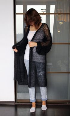 MADE TO ORDER please allow 1 weeks from order to dispatchFluffy and airy long cardigan made out of super kid mohair black (or off black color (color anthracite), or the desired color for your order. The knitted oversized cardigan is comfortably light, very soft and super cozy.     Since the material is very high quality super kid mohair the oversized knit feels soft even next to your bare skin. Effortless and luxurious knitted kimono. Plus size clothing. Bohemian clothing.Material yarn Camelot, Mohair Long Sleeve Outerwear For Layering, Long Sleeve Mohair Outerwear For Layering, Long Sleeve Mohair Outerwear, Black Bohemian Sweater For Layering, Black Knitted Long Outerwear, Bohemian Black Outerwear For Layering, Black Bohemian Sweater Coat For Fall, Bohemian Oversized Black Sweater, Black Oversized Bohemian Sweater