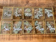 six framed wooden signs with flowers and leaves