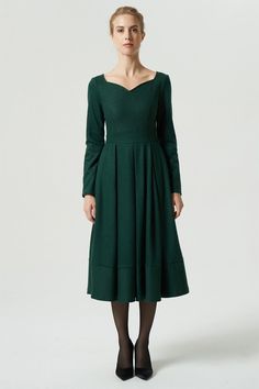 Winter A-line Pleated Maxi Dress, Winter Pleated Long Sleeve Dress, Chic Pleated Long Sleeve Dress For Winter, Green A-line Winter Dress, Formal Fall Midi Dress With Pleated Skirt, Winter Pleated Long Sleeve Midi Dress, Winter A-line Dress With Pleated Skirt, Pleated Long Sleeve Midi Dress For Winter, Long Sleeve Pleated Midi Dress For Winter