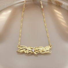 Beautiful Dainty Floral Cz Pendant Necklace. Chain Measures 20 Inches. Attached Pendant Measures 8mm Wide And 1.5 Inch Long In Length. High Quality Gold Plated Materials Are Used To Make This Beautiful Necklace. Such A Classy And Elegant Look To Accomodate Your Wardrobe. Hawaiian Necklace, Hawaiian Plumeria, Pretty Ear Piercings, Classy And Elegant, Plate Necklace, Cz Pendant, Floral Necklace, Floral Jewellery, Beautiful Necklace