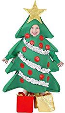 a child dressed in a christmas tree costume