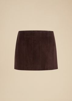 Description A paneled miniskirt in full-grain suede lined in silky cupro twill. Finished with concealed zipper closure at side. Details Material: Full-grain suede (100% lambskin) Care: Dry clean Fit: True to size. Recommended to take your normal size. Model is 5'10," wearing size 2. Brown Suede Skirt, Leather Outerwear, Suiting Fabric, Suede Mini Skirt, Brown Skirts, Suede Skirt, Dark Brown Leather, Outerwear Coats, Denim Pant