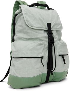 Paneled plain-woven linen-blend and nylon canvas backpack in green. · Logo embroidered at webbing carry handle · Adjustable padded shoulder straps · Zip pockets and logo patch at face · Press-release flap · Bungee-style drawstring closure · Laptop compartment at interior · Taffeta lining · Logo-engraved black hardware · H19.5 x W15.5 x D5 Supplier color: Light green Supplier code: 801590730 Sporty Green Backpack With Adjustable Strap, Green Nylon Bag With Multiple Pockets, Green Nylon Backpack With Pockets, Functional Green Backpack With Pockets, Green Backpack With Adjustable Straps, Green Nylon Backpack With Functional Pockets, Casual Green Backpack With Multiple Pockets, Green Backpack With Pockets, Green Functional Backpack With Multiple Pockets