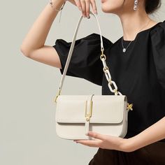 Discover Elegance and Versatility Step into the season with sophistication using our exclusive White Leather Crossbody & Shoulder Bag. Designed for the fashion-forward woman, this bag embodies elegance and versatility, perfectly complementing your spring and summer wardrobe. Whether you're attending a daytime event or an evening soiree, this bag seamlessly adapts to all occasions, ensuring you always step out in style. Premium Quality and Design Crafted with genuine cow leather, this bag boasts a soft, luxurious texture that's both durable and stylish. The saddle shape design, combined with a solid pattern and a flap pocket exterior, offers a classic yet contemporary look. Its multiple interior compartments, including a slot pocket, zipper pocket, and a spacious main compartment, provide a Elegant Flap Bag With Removable Pouch For Everyday, Elegant Everyday Flap Bag With Removable Pouch, Elegant Satchel Box Bag With Adjustable Strap, Elegant Box Shoulder Bag With Adjustable Strap, Elegant Shoulder Bag With Detachable Strap For Daily Use, Elegant Formal Bag With Adjustable Strap, Elegant Satchel With Adjustable Strap, Elegant Satchel With Adjustable Shoulder Strap, Elegant Shoulder Bag With Detachable Strap For Everyday Use