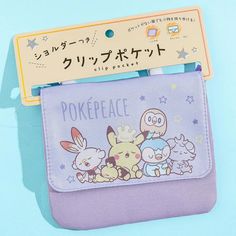 a purple wallet with cartoon characters on it