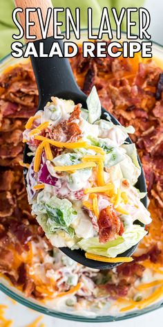 a spoonful of seven layer salad recipe with bacon and lettuce on it