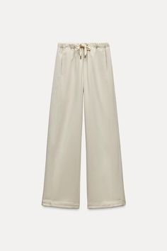 TEXTURED WIDE LEG PANTS - Ecru | ZARA United States Everyday Wide Leg Pants With Drawstring, Everyday Wide Leg Drawstring Pants, Chic Cotton Wide Leg Pants With Pull-on Style, Wide Leg Cotton Pants With Ribbed Waistband, Cotton Wide Leg Pants With Ribbed Waistband, Drawstring Pants For Elevated Casual Fall Wear, Drawstring Pants For Elevated Casual Fall Occasions, Everyday Solid Color Pants With Drawstring, Loosely Fitted Beige Wide Leg Pants With Side Pockets