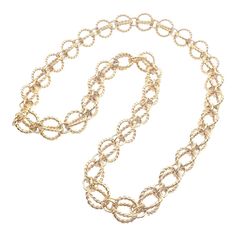 Tiffany & Co Schlumberger Circle Rope 18k Yellow Gold Long 23" Link Necklace   About Jean Schlumberger: Tiffany's celebrated jewelry designer, Jean Schlumberger (1907-1987), was born in Alsace, France. During the 1920s in Paris, Schlumberger's genius was quickly recognized. His original and eclectic designs became the rage among his friends, including Marina the Duchess of Kent and Diana Vreeland. Elsa Schiaparelli, the famed dress designer, engaged him to accessorize her new collections with buttons and costume jewelry. In 1956, Jean Schlumberger joined Tiffany & Co., where he had the freedom to explore uncharted territory, mixing yellow beryls, amethysts, emeralds, sapphires and aquamarines in mountings of yellow gold to create classic pieces such as the "Bird of Paradise" clip. A great Gold Hallmarked Necklaces For Evening, Formal Gold-tone Necklace With Lobster Clasp, Classic Yellow Gold Necklace For Party, Yellow Gold Long Necklace For Party, Luxury Evening Jewelry With Lobster Clasp, Formal Gold-plated Necklace With Lobster Clasp, Classic Yellow Gold Party Chain Necklace, Classic Yellow Gold Chain Necklace For Party, Yellow Gold Party Chain Necklace