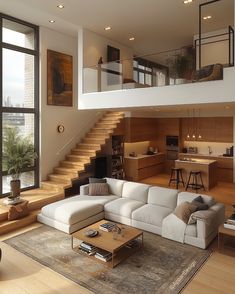 a living room filled with furniture next to a stair case