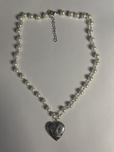 Necklace - pearl beads with heart locket 11-12 inches long with adjustable length Beaded Locket Necklace, Pearl Locket Necklace, Wire Pearl Necklace, Heart-shaped Pearl Beaded Chain Jewelry, Heart-shaped Pearl Beaded Necklace, Beaded Pearl Necklace For Valentine's Day, Pearl Beaded Necklaces With Heart Pendant, Pearl Beaded Heart Pendant Necklace, Pearl Heart Pendant Beaded Necklace