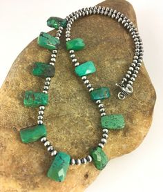 Masha Indian Native American Jewelry   -On Route 66 -         Albuquerque, New Mexico U.S.A     Item Specifics            Stone : Turquoise Size : 20" Color : Green SKU : 8867 Free gift with Purchases (Till Stocks Last)  Genuine Sterling Silver Jewelry  This beautiful Necklace is made from all 925 Sterling Silver Beads and Findings.  These Beads are meticulously hand strung and assembled by the artist creating the perfect balance of fall, color and shine. Necklaces are a must have for any collection, whether you are just starting out or are a serious collector you will not be disappointed with this work of art. These necklaces have excellent fall and can even be stacked with others, fashioned with a pendant or worn double wrapped to give you different look every time.    Authenticity you c Turquoise Necklaces, Artisan Jewelry Necklaces, Handcrafted Artisan Jewelry, Fall Color, Beautiful Necklace, American Jewelry, Green Turquoise, Route 66, Native American Jewelry