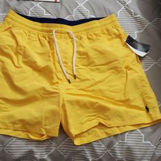 Brand New Polo Swimming Trunk Size Xl Yellow And Navy Blue Great For Summer With Lining Inside See Photos Accepting Offer's Blue And Yellow Outfit Men, Yellow Short Swim Trunks For Beach Season, Yellow Casual Short Swim Trunks, Casual Yellow Short Swim Trunks, Yellow Casual Short-length Swim Trunks, Yellow Relaxed Fit Bottoms For Beach Season, Yellow Short Swim Trunks For Spring, Sporty Yellow Swim Trunks Short Length, Sporty Yellow Short Swim Trunks