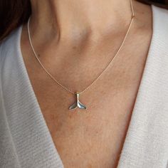 "A beautiful  Sterling silver Whale Tail necklace, made for ocean lovers, seeking to wear a part of the big blue sea on their neck to wherever they go. The whale fluke necklace is a handmade design from 925 Sterling Silver with a lot of love for the ocean. This minimalist whale fluke Jewelry comes beautifully wrapped in a nice package and is ready to be given as a gift. ❤ 𝗠𝗘𝗔𝗦𝗨𝗥𝗘𝗠𝗘𝗡𝗧𝗦❤ Pendant height: 0.59 \"/ 1.5 cm. Pendant width: 0.59''/1.5 cm. Please choose your length from the d Whale Fluke, Whale Tail Necklace, The Big Blue, The Whale, Whale Tail, Necklace Minimalist, Ocean Lover, Big Blue, Handmade Design